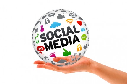 A person's hand holding a social media ball, showcasing Fall 2015 trends.