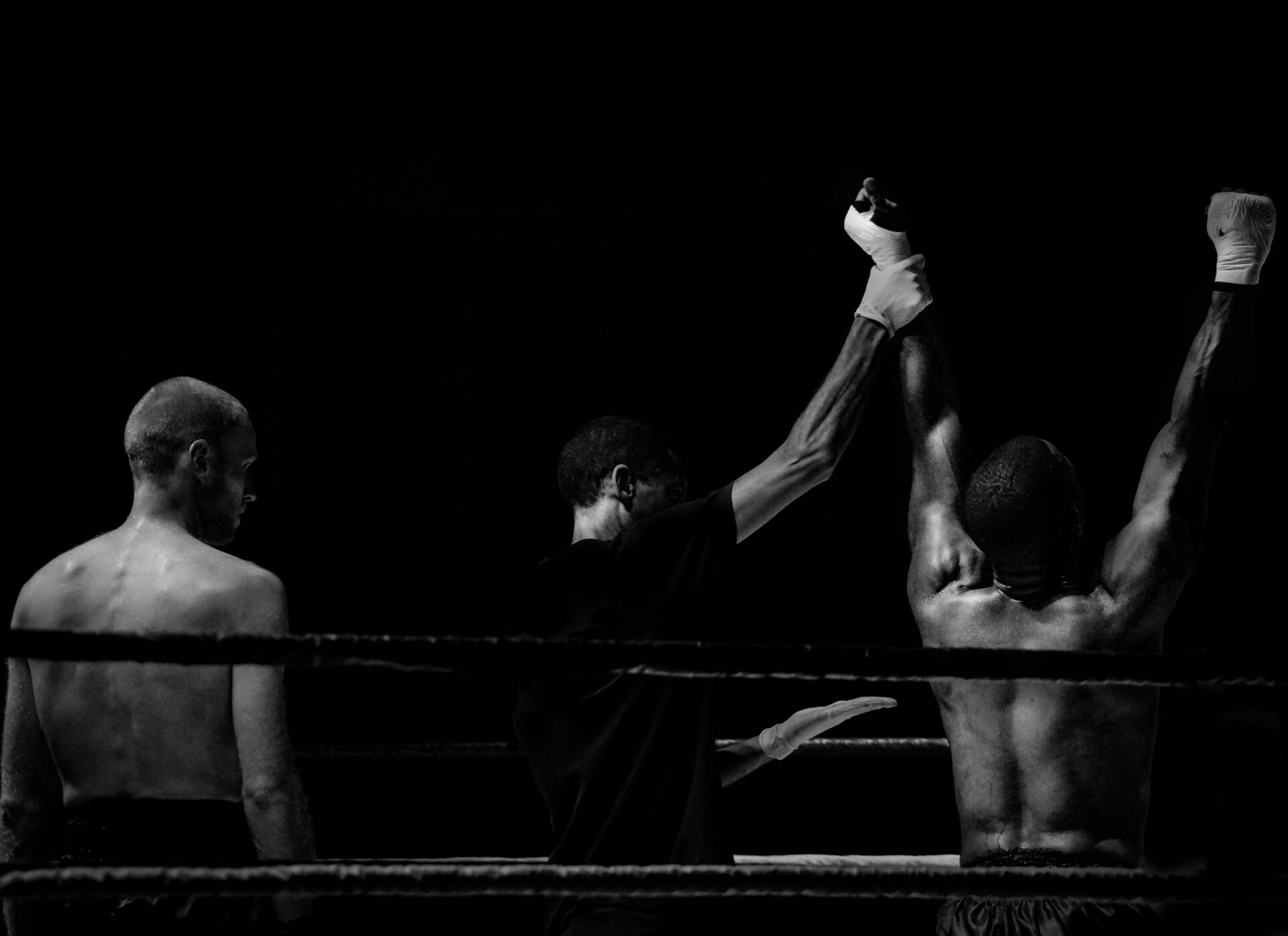 A monochrome image capturing two pugilists in the ring demonstrates your unique approach.
