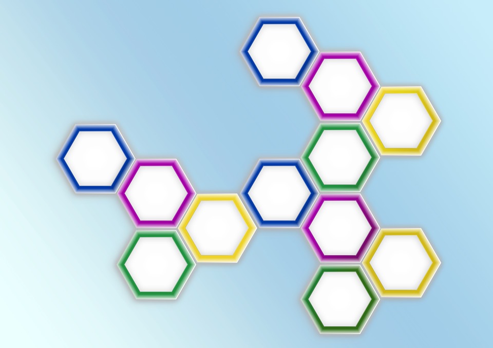 A colorful hexagon puzzle on a blue background.
